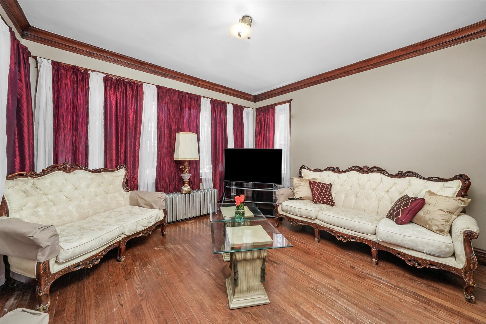 3009 West 40th Place Chicago, IL 60632 - Photo 12 of 33 a living room with furniture and a flat screen tv