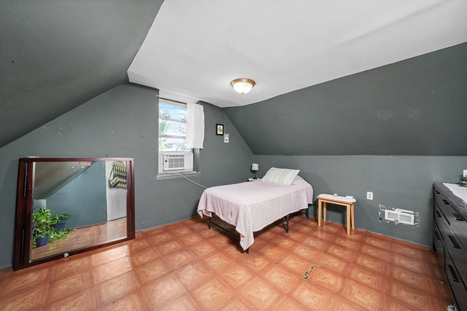 3009 West 40th Place Chicago, IL 60632 - Photo 22 of 33 a bedroom with a bed and a mirror