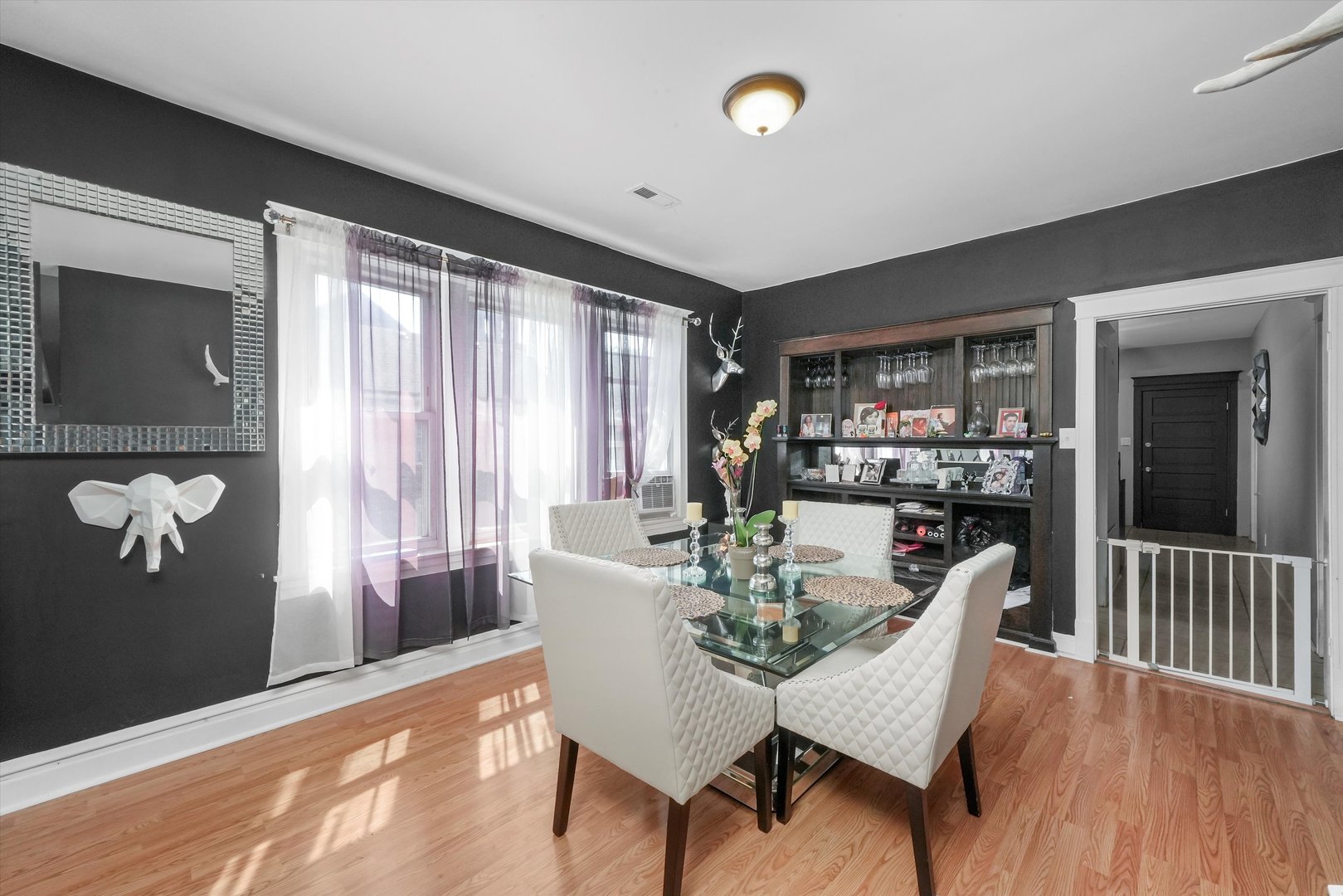 3009 West 40th Place Chicago, IL 60632 - Photo 5 of 33 a dining room with furniture and window