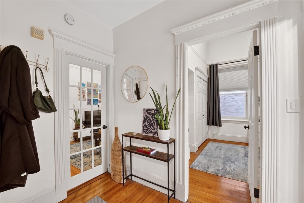 8 Garrison Street, Unit 111 Boston, MA 02116 - Photo 5 of 15 a view of walk in closet with clothes and shoes