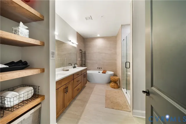 a bathroom with a double vanity sink and a mirror