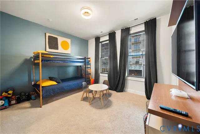 a room with furniture and a window