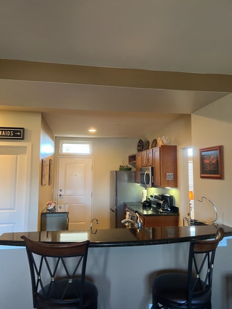 3706 Lower Honoapiilani Road, Unit D40 Lahaina, HI 96761 - Photo 1 of 1 a view of a workspace with furniture