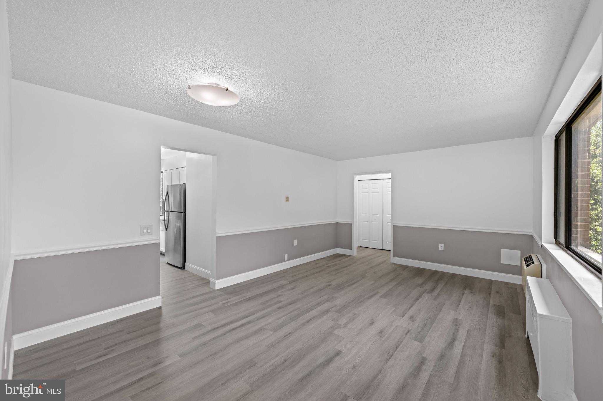 4717 1st Street Southwest, Unit 203 Washington, DC 20032 - Photo 3 of 16 Spacious living area ready for personalization