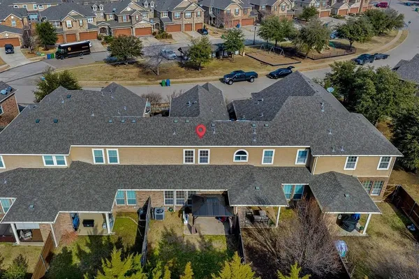 an aerial view of multiple houses
