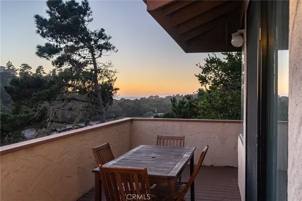 a view of chair and table in patio