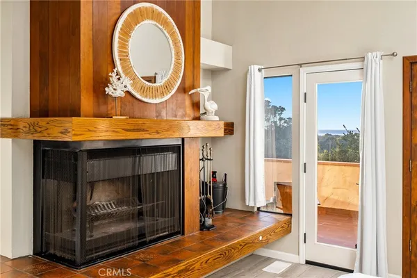 a room with furniture and a fireplace