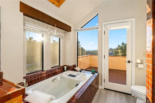 a bathroom with a tub and a sink