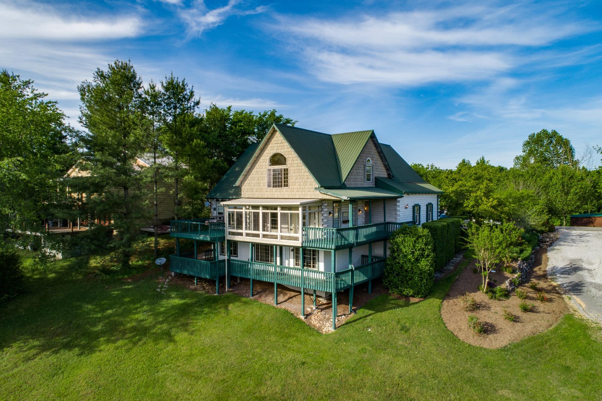 185 Dillon Road Baxter, TN 38544 - Photo 1 of 25 a view of a house with a yard balcony and sitting area