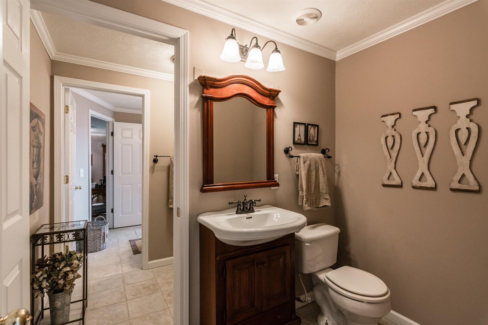 185 Dillon Road Baxter, TN 38544 - Photo 11 of 25 a bathroom with a sink a toilet and shower