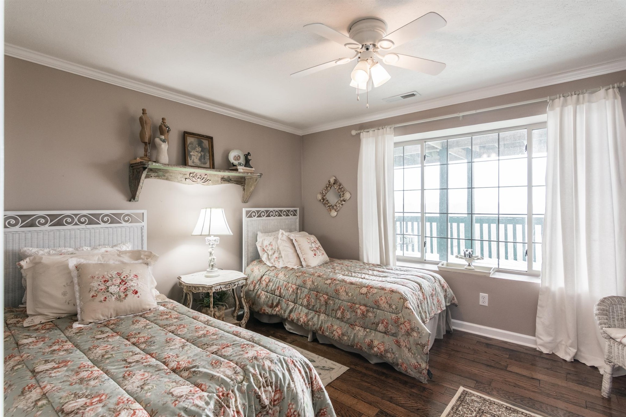 185 Dillon Road Baxter, TN 38544 - Photo 9 of 25 a bedroom with two large bed and a window