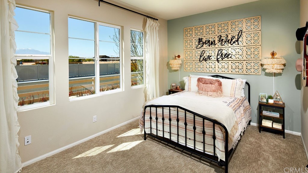 44431 Beringer Drive Indio, CA 92203 - Photo 14 of 17 a bedroom with a bed and a window