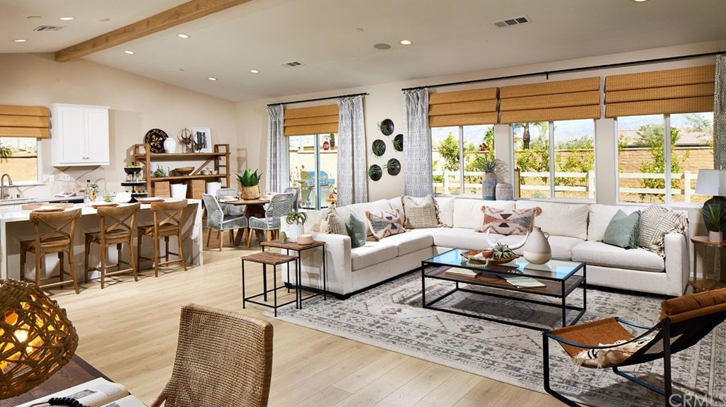 44431 Beringer Drive Indio, CA 92203 - Photo 3 of 17 a living room with furniture and a large window