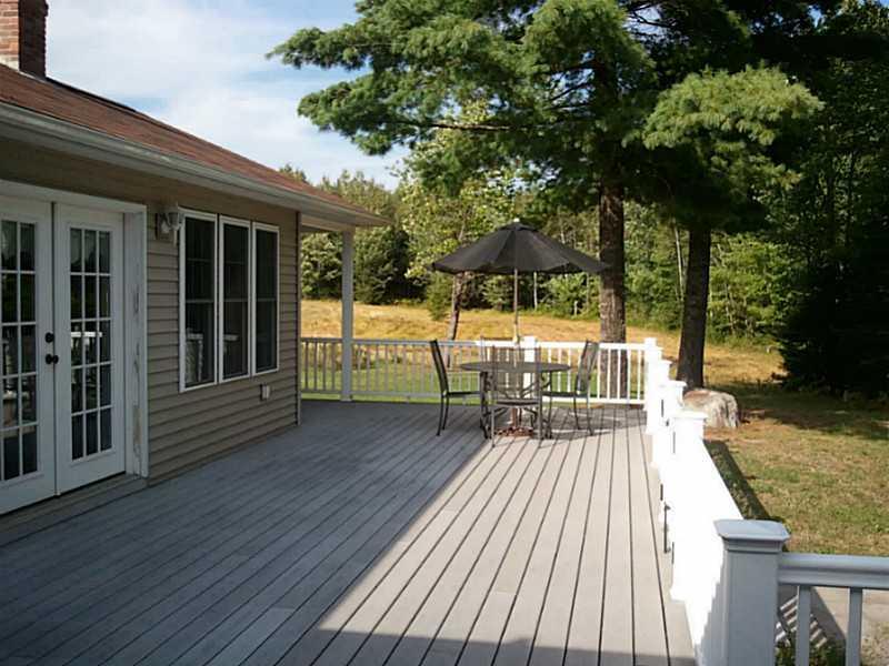 144 Station Road Lincoln, ME 04457 - Photo 28 of 35 Patio/Deck. Wrap around deck.
