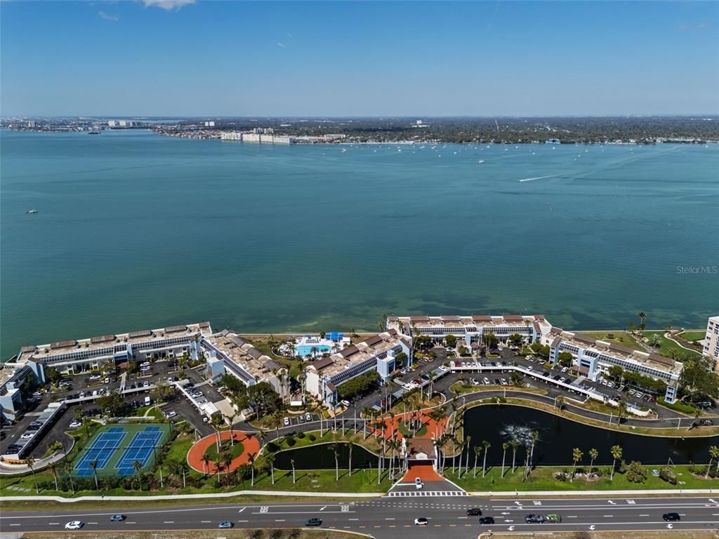 5151 Isla Key Boulevard South, Unit 421 St. Petersburg, FL 33715 - Photo 44 of 61 a view of a water with lawn chairs