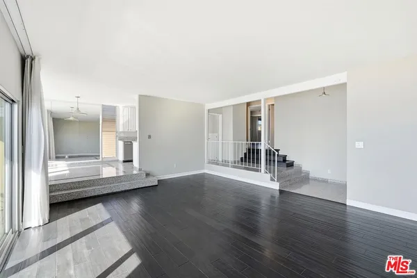 a view of livingroom with furniture and wooden floor