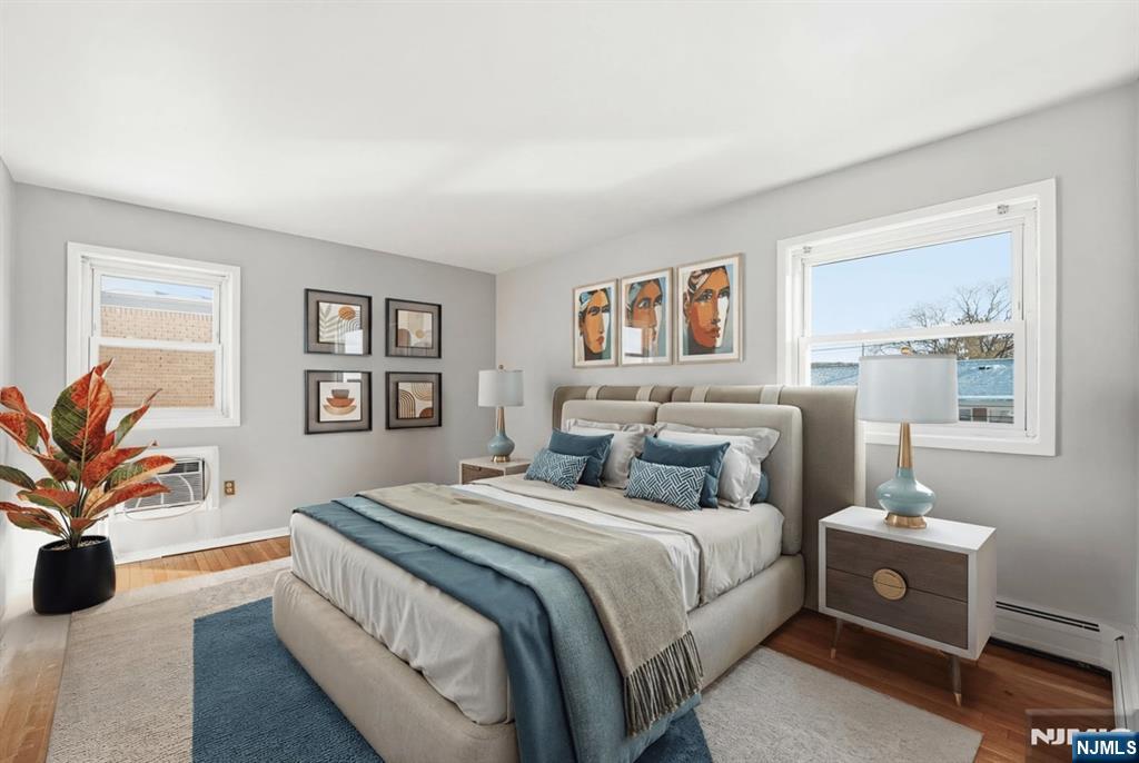 28 Knox Terrace Wayne, NJ 07470 - Photo 3 of 15 a bedroom with a bed and a couch