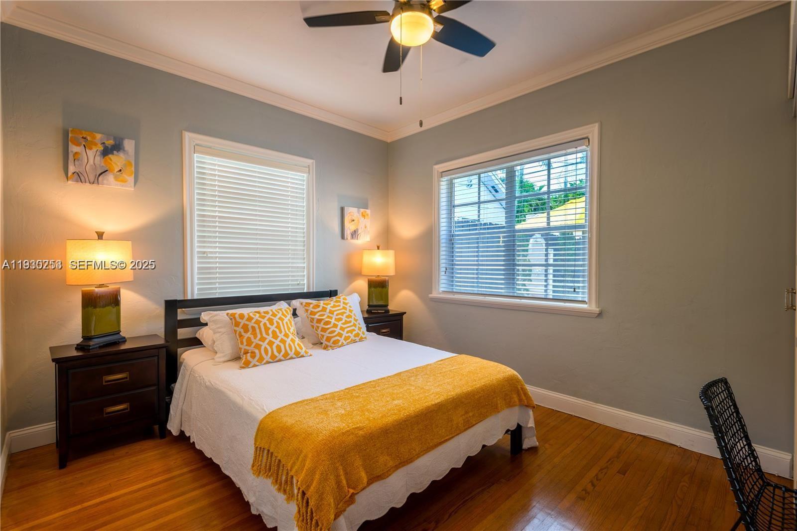 2308 Southwest 23rd Terrace Miami, FL 33145 - Photo 11 of 27 a bedroom with a bed and a window