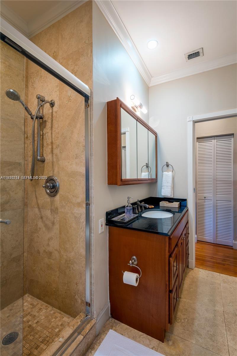 2308 Southwest 23rd Terrace Miami, FL 33145 - Photo 17 of 27 a kitchen with a stove and a shower