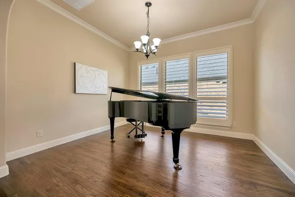 a view of a livingroom with chairs