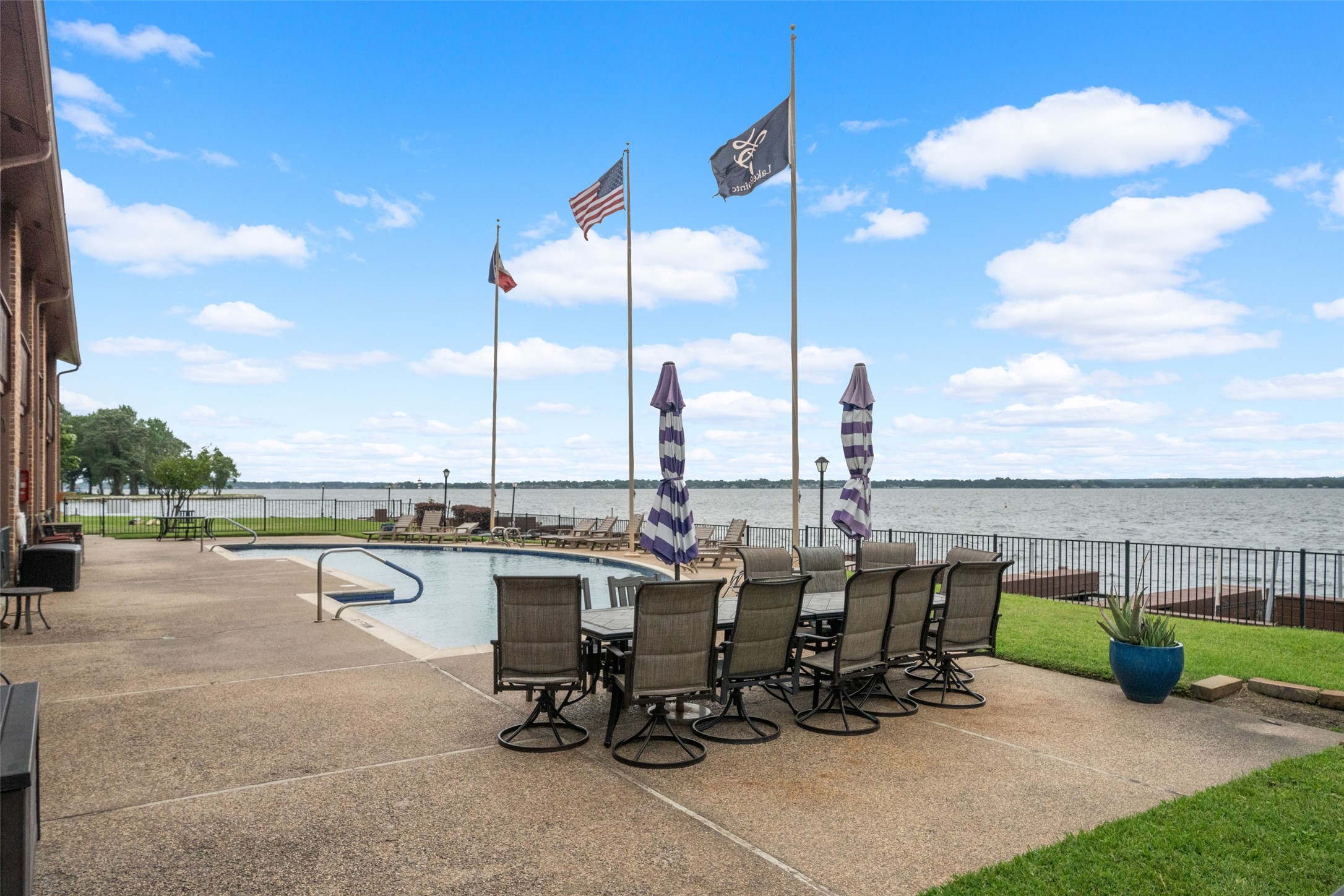 Community Pool overlooking the water for you to enjoy at this private community on Lake Conroe.  801 River Rd #F120