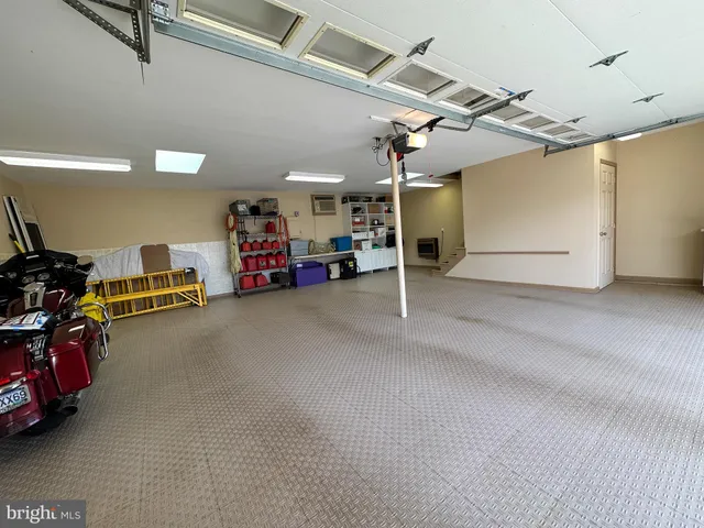 a swimming pool with trees in the background