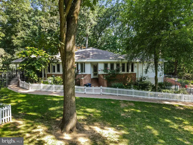 a bedroom with a bed and a fireplace