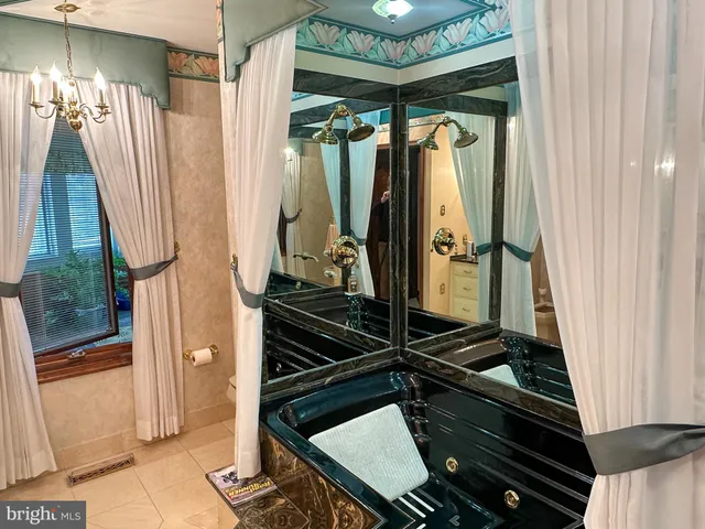 a bed room with a bed and furniture