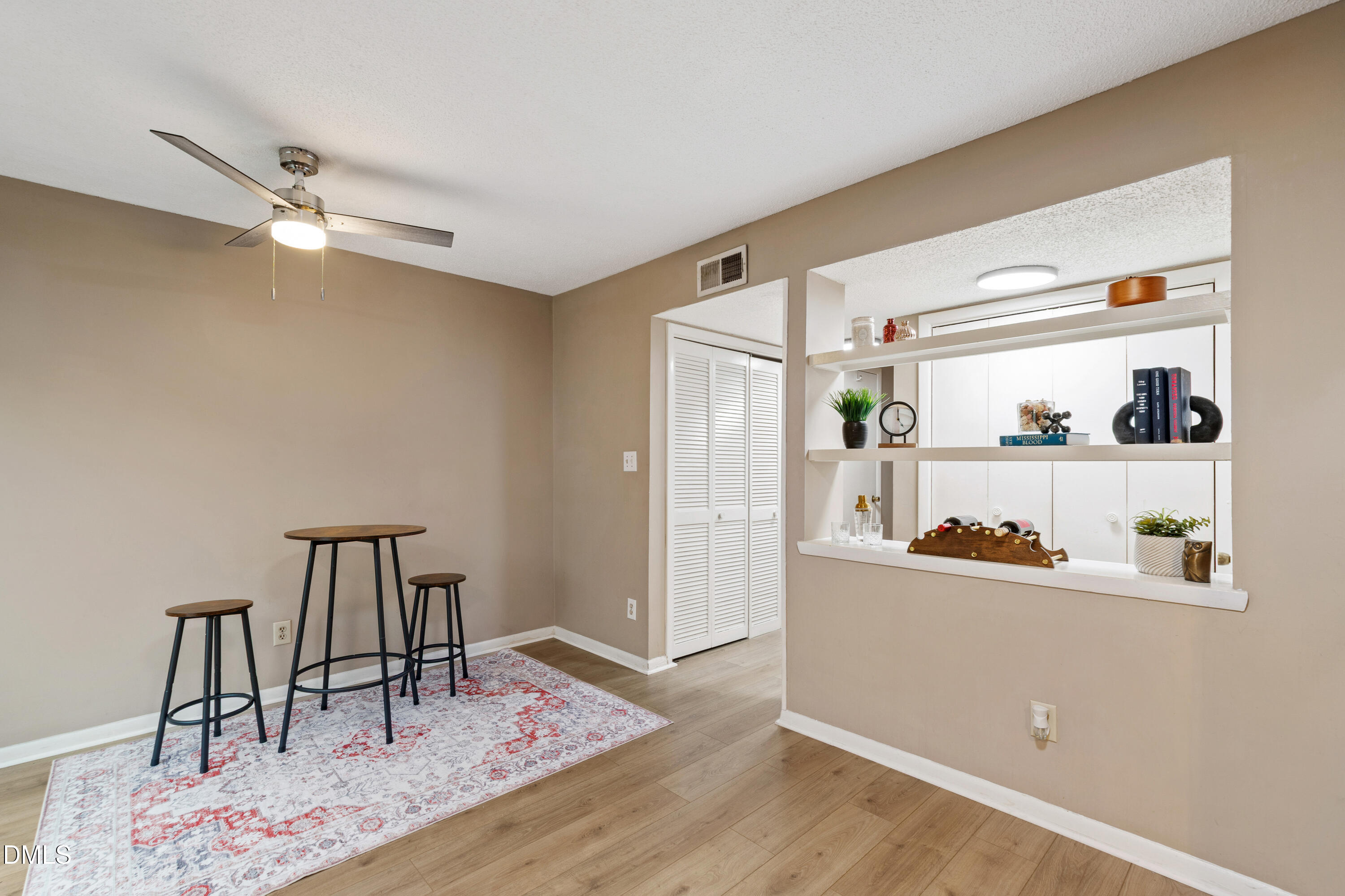 5810 Shady Grove Circle Raleigh, NC 27609 - Photo 15 of 21 a view of a workspace with furniture and wooden floor