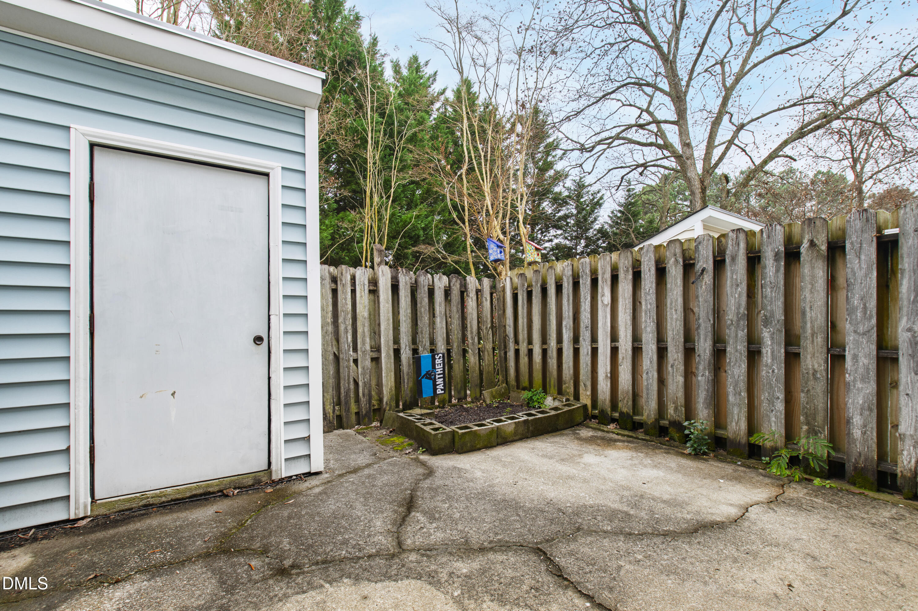 5810 Shady Grove Circle Raleigh, NC 27609 - Photo 17 of 21 a backyard of a house with wooden fence