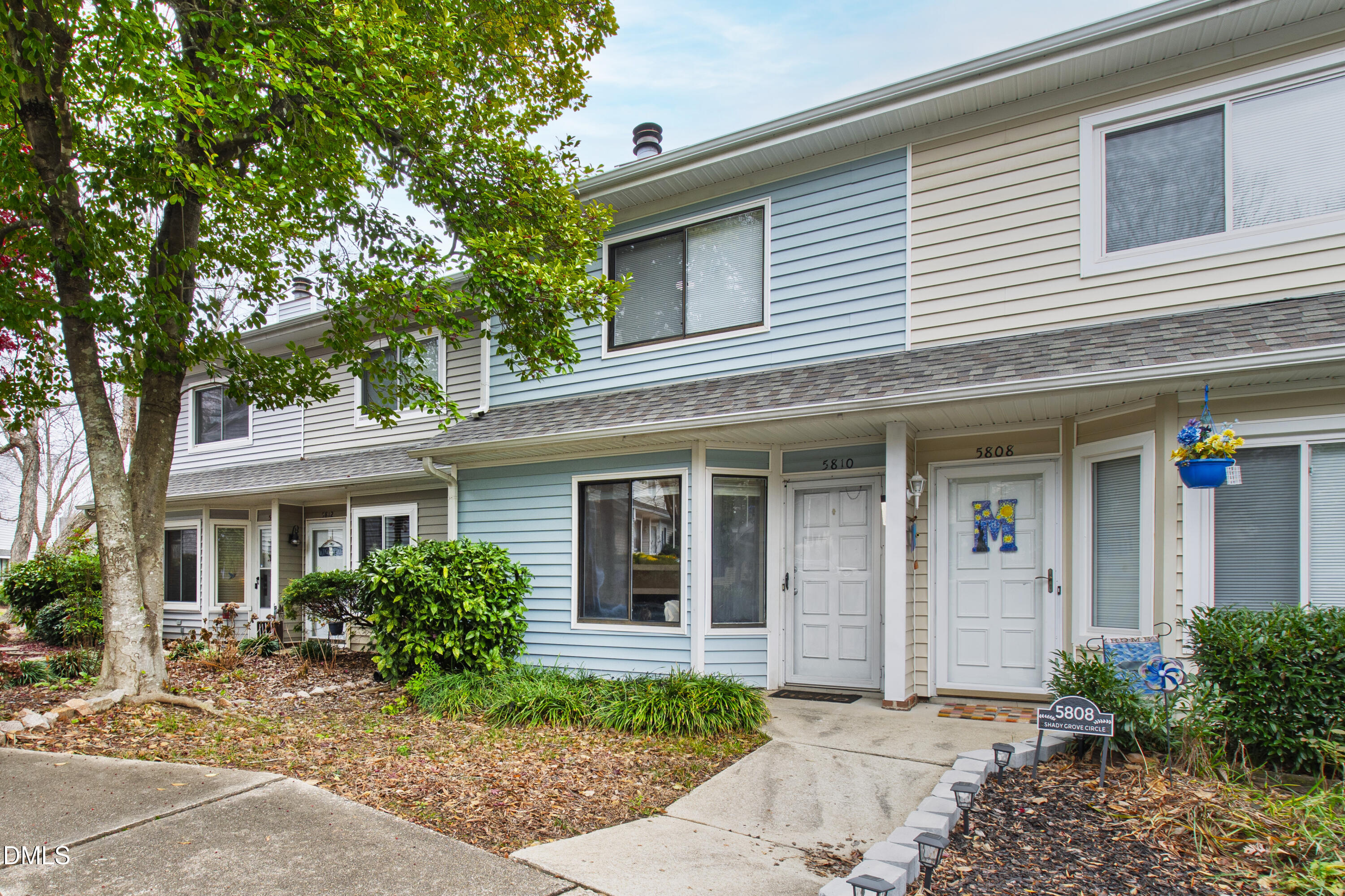 5810 Shady Grove Circle Raleigh, NC 27609 - Photo 19 of 21 a front view of a house with garden
