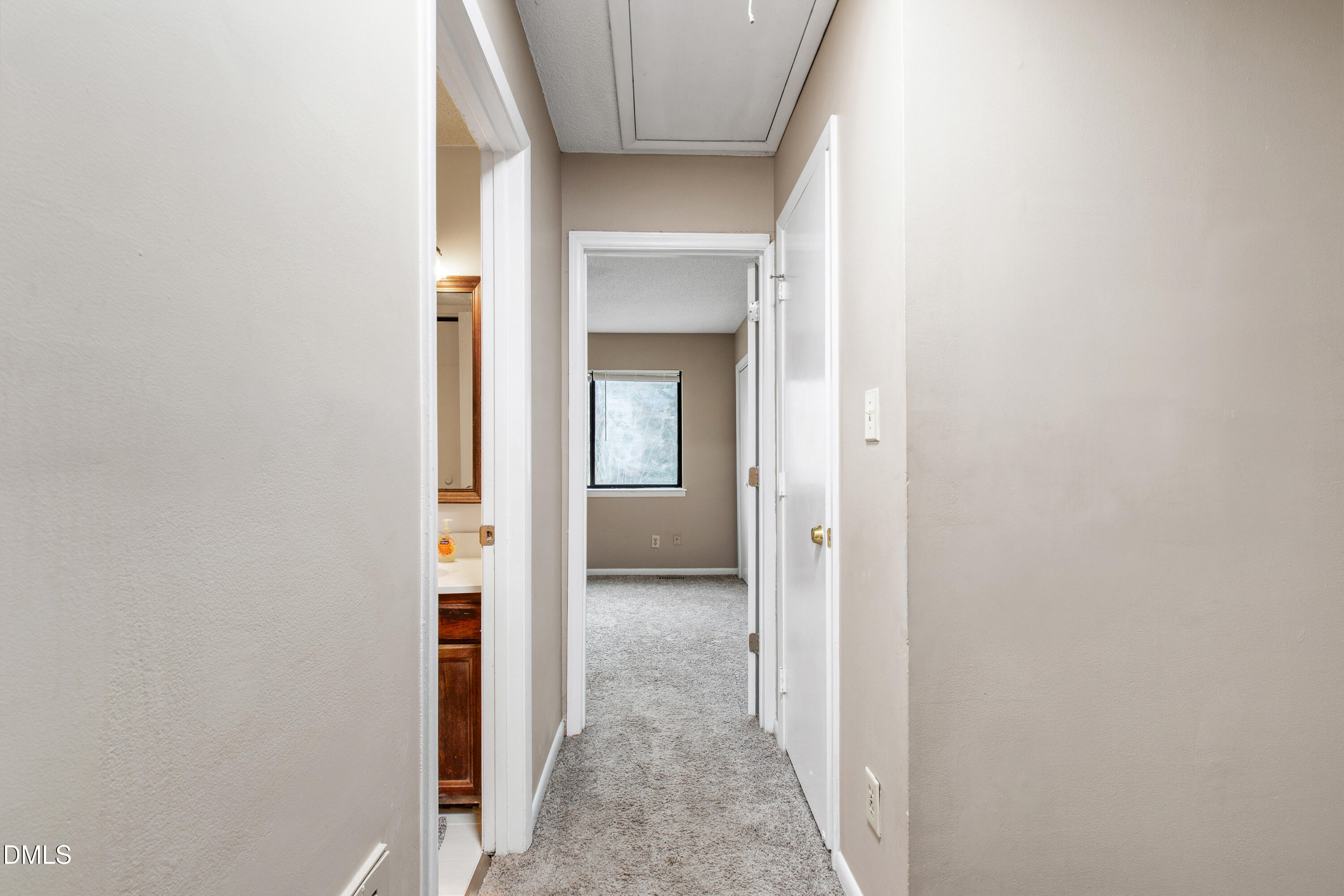 5810 Shady Grove Circle Raleigh, NC 27609 - Photo 7 of 21 a view of a livingroom from a hallway