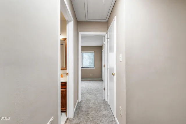 a view of a livingroom from a hallway