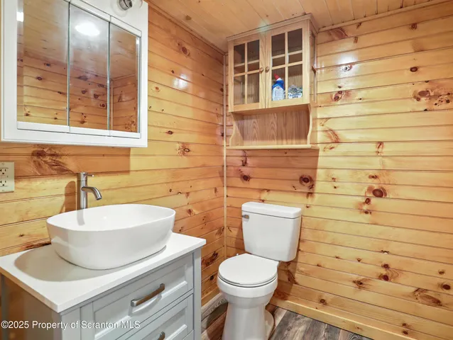 a bathroom with a toilet and a sink