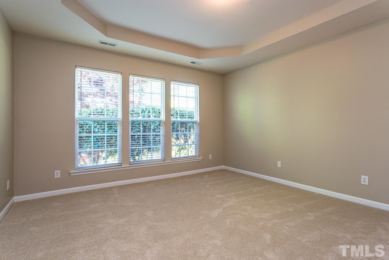 3601 Cathedral Bell Road Raleigh, NC 27614 - Photo 16 of 25 a view of an empty room with a window