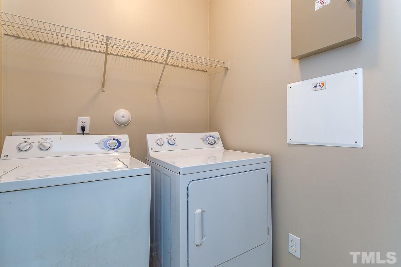 3601 Cathedral Bell Road Raleigh, NC 27614 - Photo 19 of 25 a utility room with dryer and washer