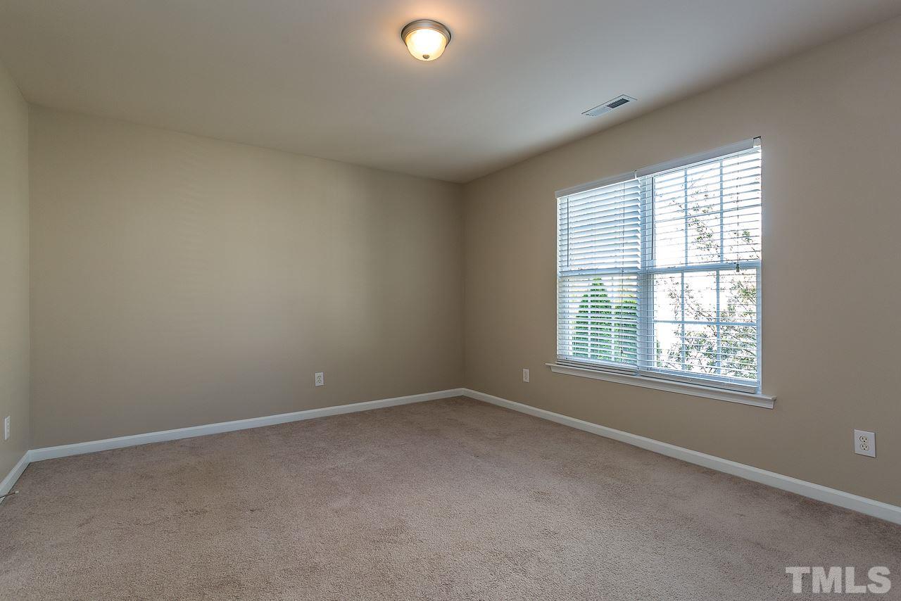 3601 Cathedral Bell Road Raleigh, NC 27614 - Photo 20 of 25 an empty room with a window