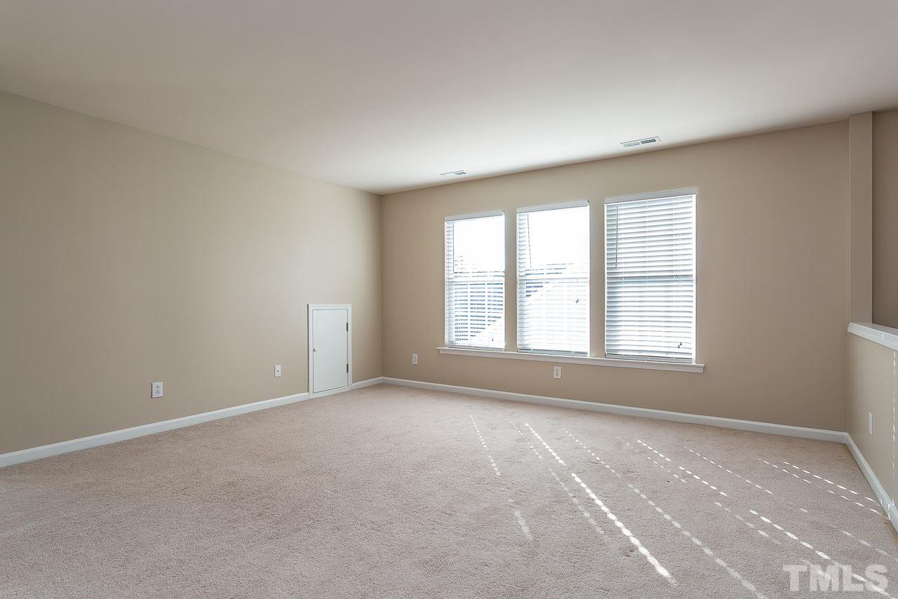 3601 Cathedral Bell Road Raleigh, NC 27614 - Photo 22 of 25 a view of an empty room with a window