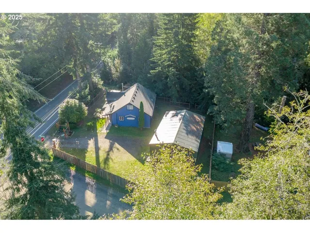 a view of front of house with a yard