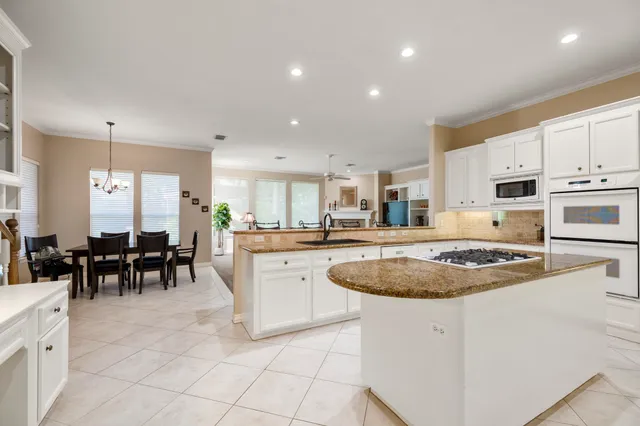 a kitchen with counter space cabinets and appliances