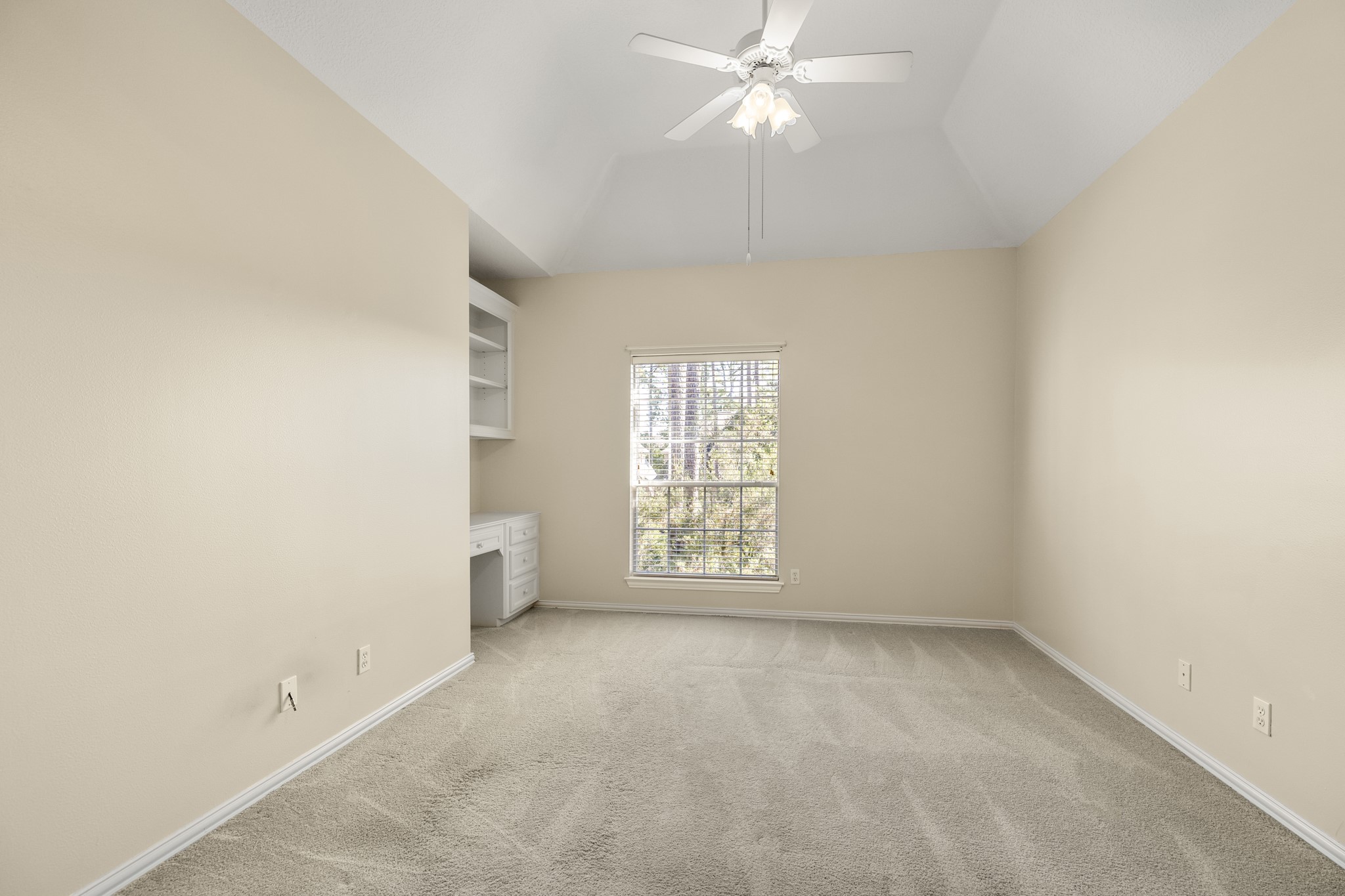 19315 Puget Lane Spring, TX 77388 - Photo 28 of 49 an empty room with a window and a fan