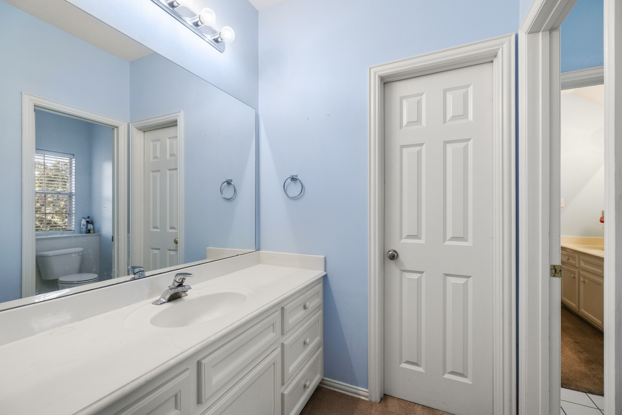 19315 Puget Lane Spring, TX 77388 - Photo 29 of 49 a bathroom with a sink and a mirror