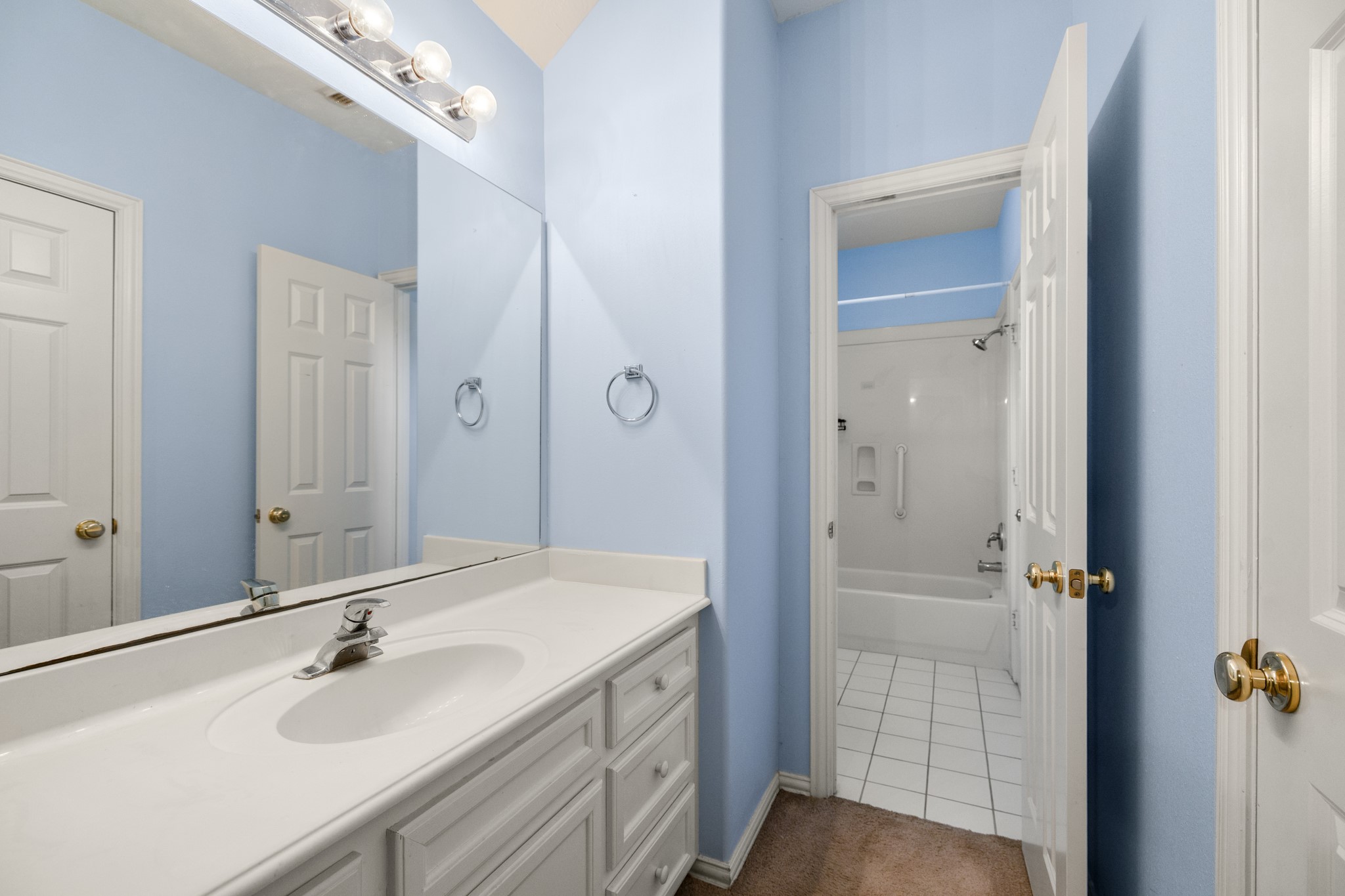 19315 Puget Lane Spring, TX 77388 - Photo 31 of 49 a bathroom with a sink and a mirror