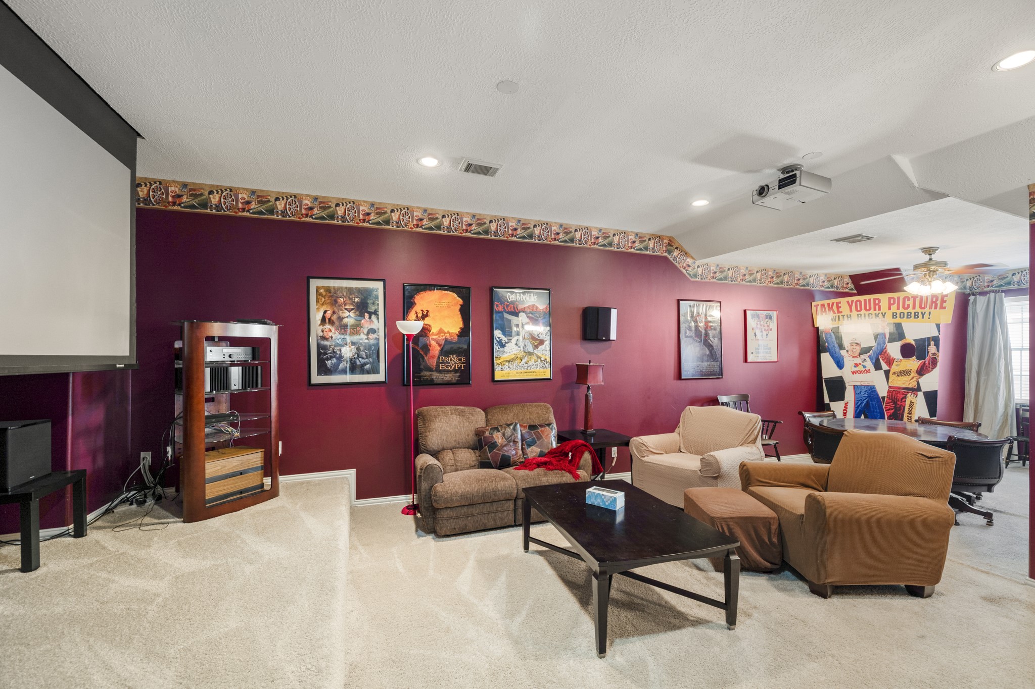 19315 Puget Lane Spring, TX 77388 - Photo 33 of 49 a living room with furniture and a flat screen tv