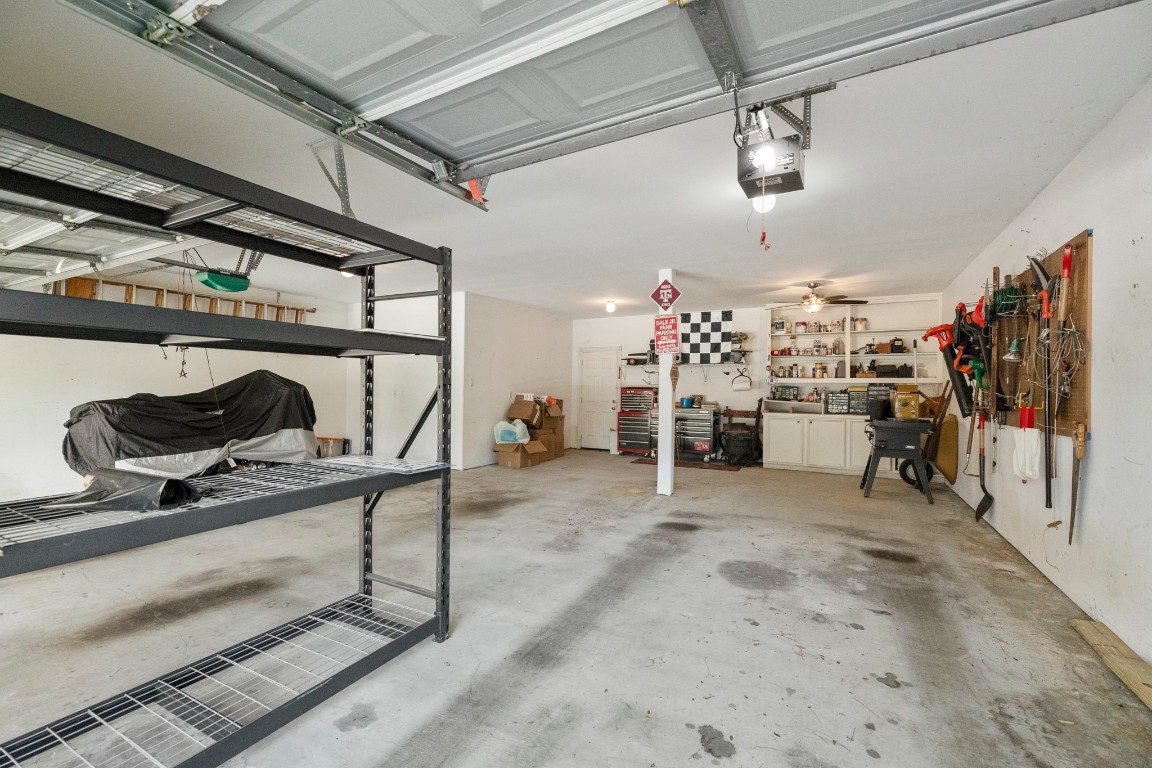 19315 Puget Lane Spring, TX 77388 - Photo 48 of 49 this garage is guge with room for 3 cars plus your shop area in front