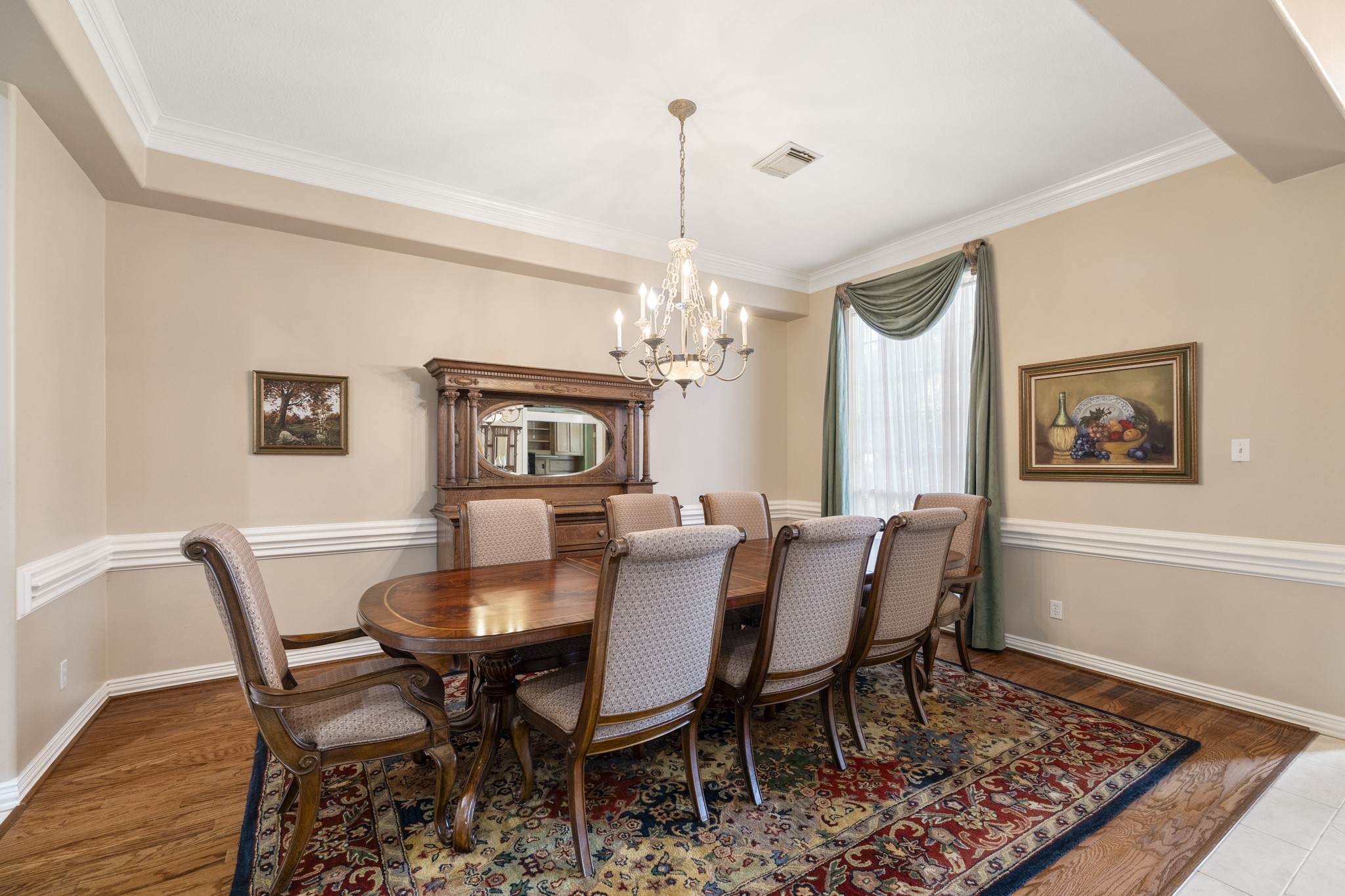 19315 Puget Lane Spring, TX 77388 - Photo 6 of 49 a view of a dining room with furniture and wooden floor