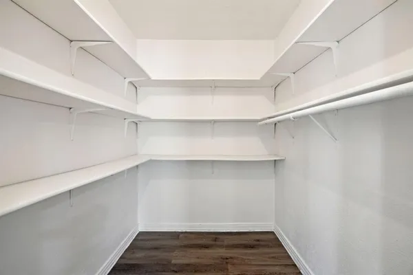 a view of an empty walk in closet