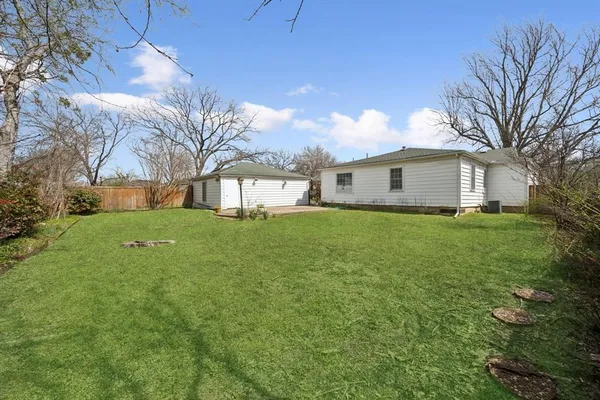 a house view with a garden space