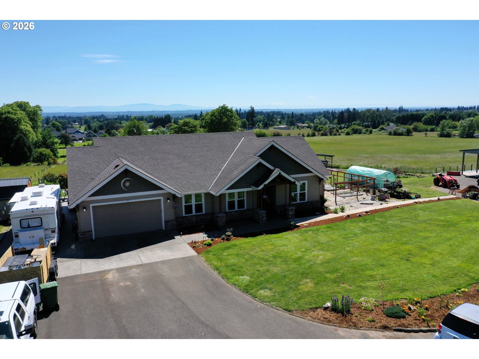 33058 Church Road Warren, OR 97053 - Photo 3 of 45 a front view of a house with garden