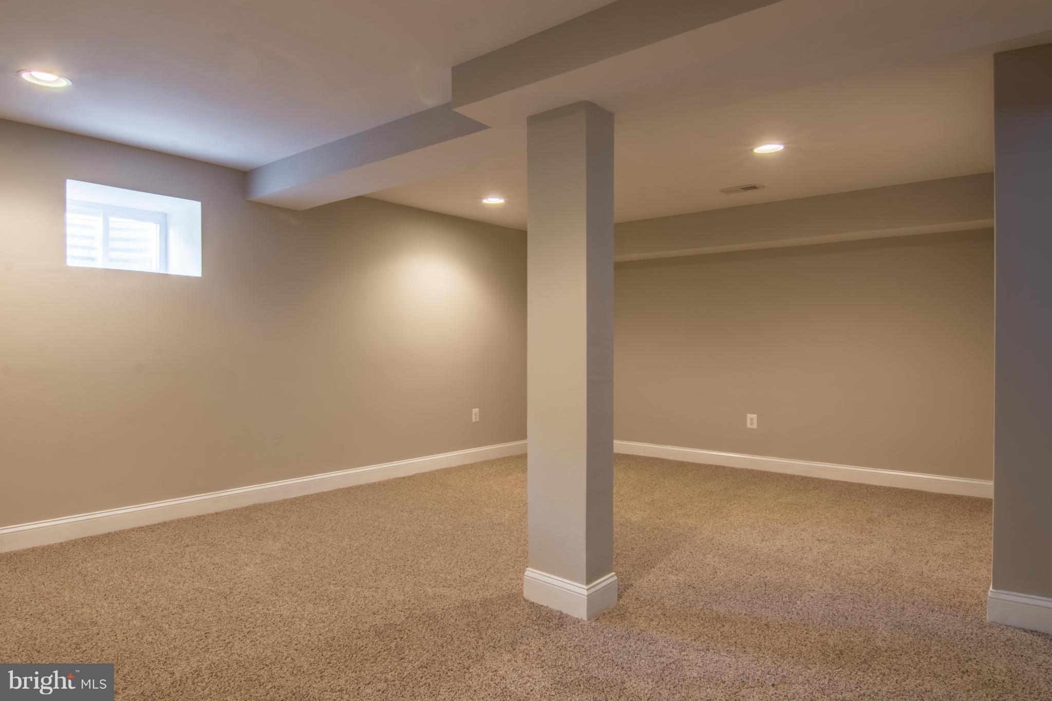 922 Bardswell Road Catonsville, MD 21228 - Photo 14 of 30 an empty room with a empty space and windows